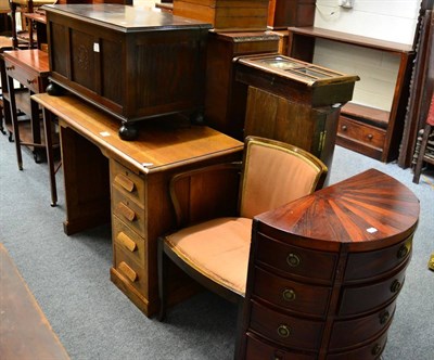 Lot 1178 - An early 20th century oak kneehole desk, together with an oak blanket box, an occasional chair...