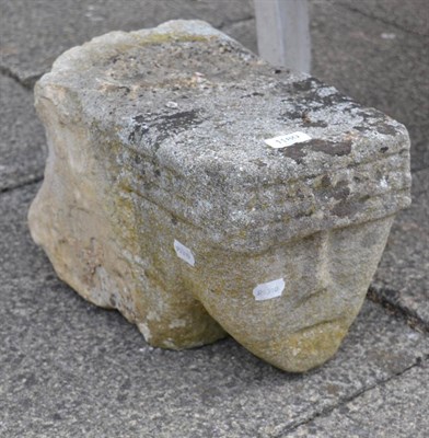 Lot 1180 - A medieval carved stone head