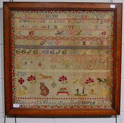 Lot 1196 - A large oak framed sampler worked by Elizabeth Christisen?, dated 1869