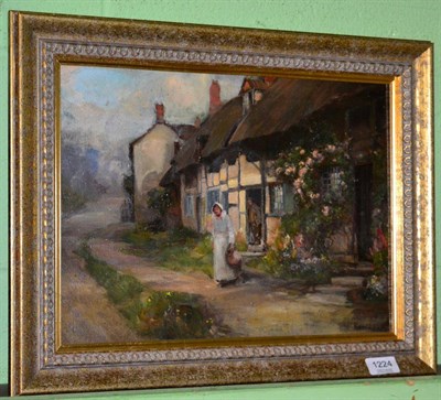 Lot 1224 - Attributed to Harold Knight RA (1874 - 1961) Figures before a thatched cottage, bears...