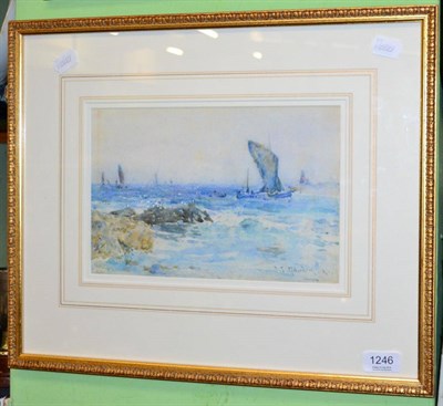 Lot 1246 - Frederick Stuart Richardson (1855 - 1944) Fishing boats off a coastline, signed, watercolour