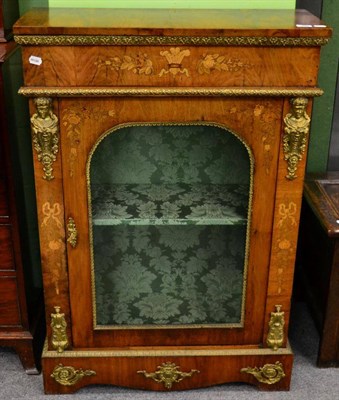 Lot 1290 - A French walnut veneered and inlaid glazed bookcase