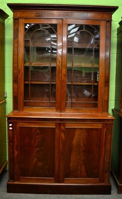 Lot 1293 - A 19th century glazed mahogany bookcase