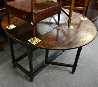 Lot 1300 - An 18th century and later oak gateleg table