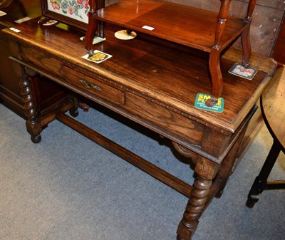 Lot 1302 - An oak sideboard