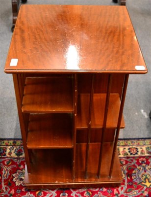 Lot 1326 - A mahogany revolving bookcase