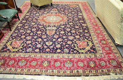 Lot 1329 - Tabriz carpet, Iranian Azerbaijan, the raspberry medallion surrounded by vines enclosed by palmette