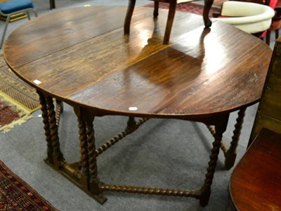 Lot 1336 - An 18th century and later oak gateleg table