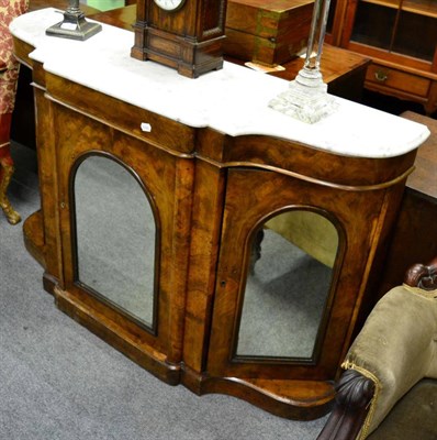 Lot 1340 - A Victorian walnut credenza with marble top