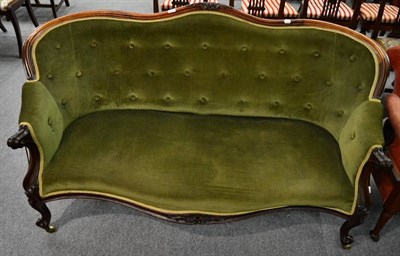 Lot 1352 - A Victorian carved rosewood button back sofa