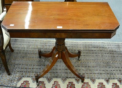 Lot 1367 - George III mahogany fold-over tea table