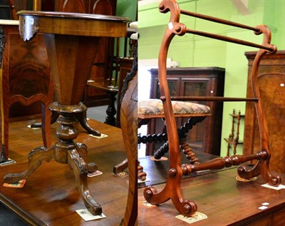 Lot 1384 - Victorian inlaid chess top carved sewing table; together with a Victorian mahogany towel rail