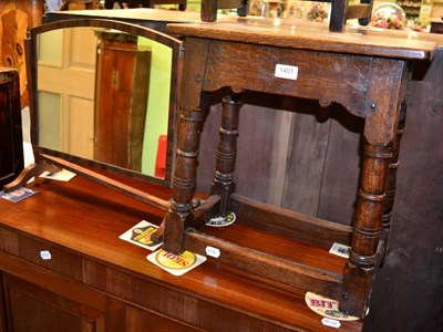 Lot 1401 - An oak stool; together with a 19th century table mirror (2)