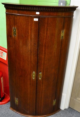 Lot 1403 - George III oak corner cupboard