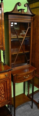 Lot 1413 - An Edwardian inlaid mahogany display cabinet