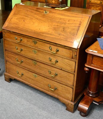 Lot 1423 - George III mahogany bureau