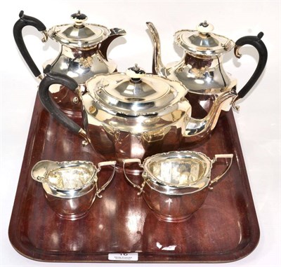 Lot 16 - A silver five piece tea and coffee service, William Devenport, Birmingham 1924, oval panelled...