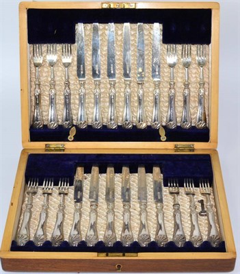 Lot 17 - Twelve pairs of Edwardian silver fruit knives and forks, Robert Pringle, Sheffield 1908, in a...