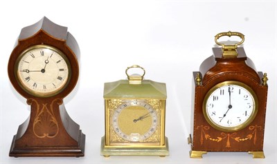 Lot 23 - An Edwardian inlaid mahogany mantle timepiece, another similar and an onyx and brass mantle...