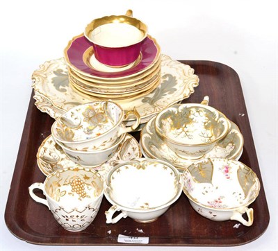 Lot 48 - A collection of 19th century Rockingham tea cups and saucers, various patterns, with assorted...
