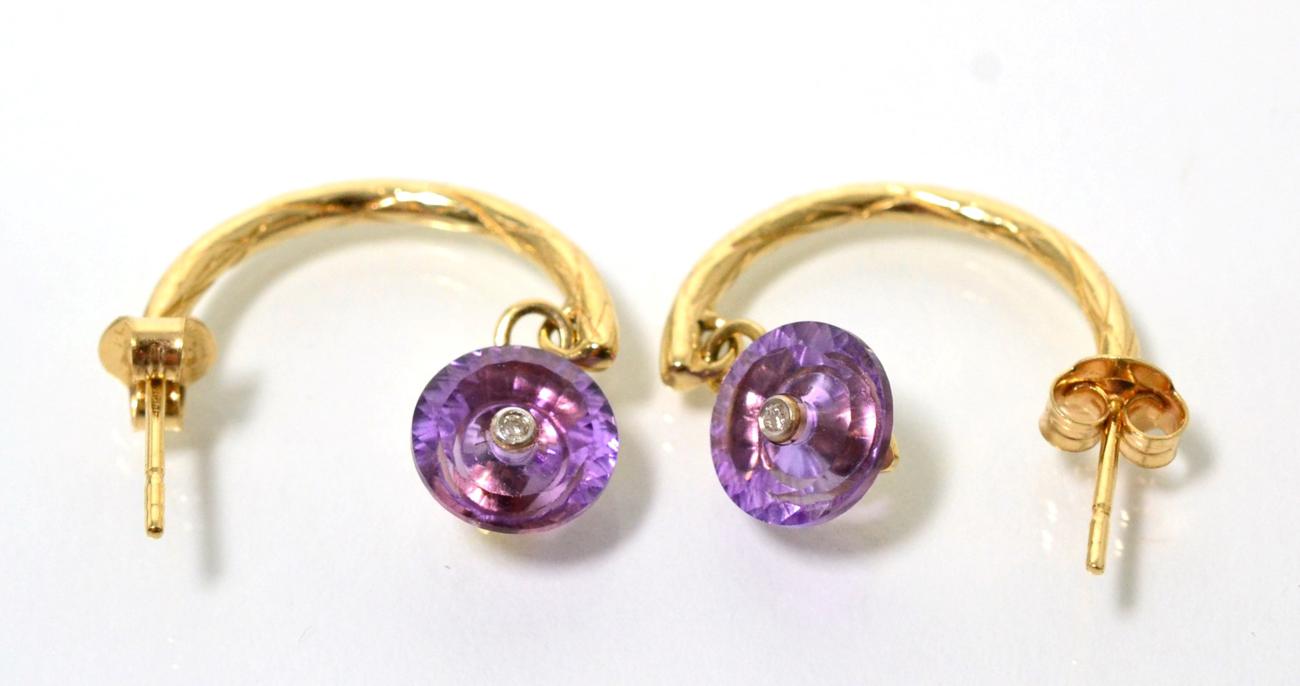Lot 53 - A pair of amethyst and diamond Lehrer Torusring half hoop earrings