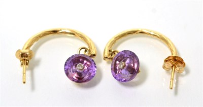 Lot 53 - A pair of amethyst and diamond Lehrer Torusring half hoop earrings