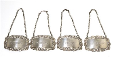 Lot 62 - A set of four silver decanter labels by Richards & Knight, London 1972