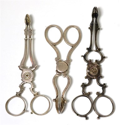 Lot 67 - A pair of George III silver sugar nips, maker's mark indistinct; and two further pairs of...