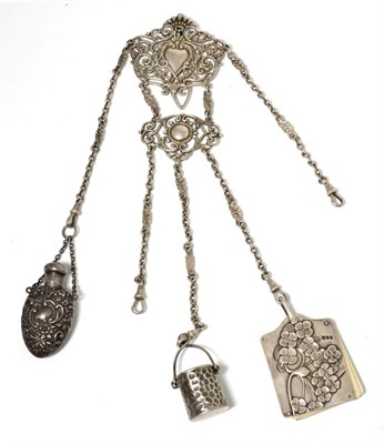 Lot 68 - An Edwardian silver chatelaine, Birmingham 1902, of pierced design, with an associated scent...