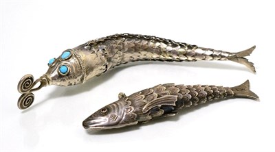 Lot 74 - A Dutch silver articulated model of a fish with hinged head; together with a further white...