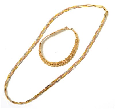 Lot 90 - A 9 carat tri-colour gold plaited herringbone chain necklace, length 46cm and a 9 carat gold...