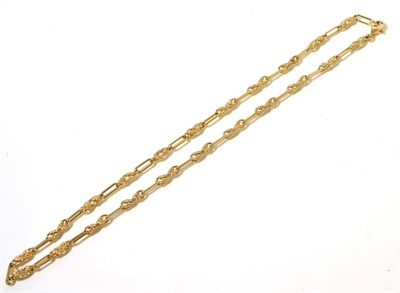 Lot 112 - A 9 carat gold fancy link necklace, of long bar and knot links, length 51cm