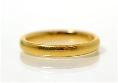 Lot 115 - A 22 carat gold band ring
