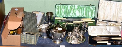 Lot 139 - An electroplated three piece tea service; egg cruet; various boxed serving pieces; a group of...