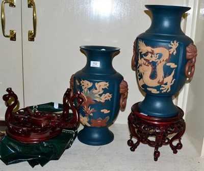 Lot 152 - A pair of modern Chinese vases in stands (one stand a.f.)