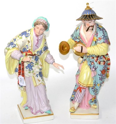 Lot 153 - A pair of large Continental painted porcelain figures (a.f.)