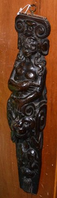 Lot 155 - A 17th century carved oak term figure, as a bearded man over a leaf sheathed scroll volute hung...