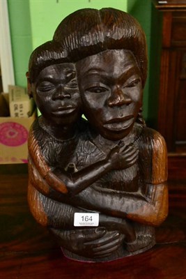 Lot 164 - Jamaican School (20th century), a carved hardwood bust of a figural mother and child, 39cm high