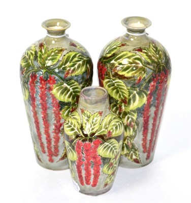 Lot 165 - Three Cobridge stoneware vases in a foliate trail pattern date 3/11/00, the smallest 16.5cm,...