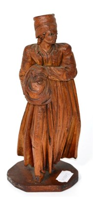 Lot 176 - A Continental carved wood figure representative of one of the deadly sins