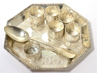 Lot 189 - A Persian white metal octagonal shaped tray; six napkin rings; Continental spoon; and a silver...
