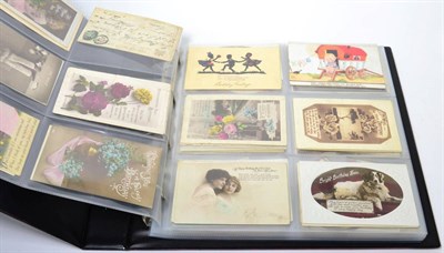 Lot 195 - An album of postcards including; Mabel Lucie Attwell, early 20th century photographic examples