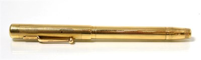 Lot 220 - A Swan fountain pen in a 9 carat gold case and nip stamped '14ct'