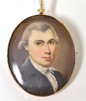 Lot 232 - English School (circa 1800), miniature bust portrait of a Gentleman, with a wig, wearing grey...