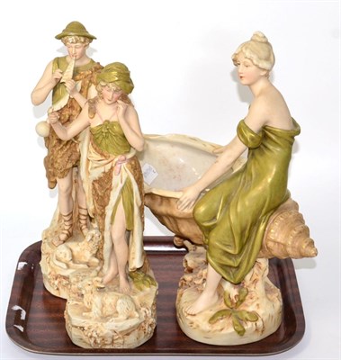Lot 244 - A pair of Royal Dux figures (damaged) and a Royal Dux maiden on a shell (3)