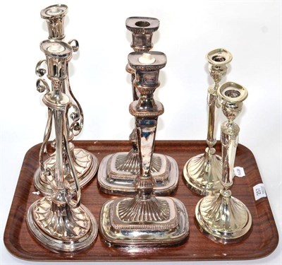 Lot 257 - Three pairs of silver plated candlesticks (all converted)