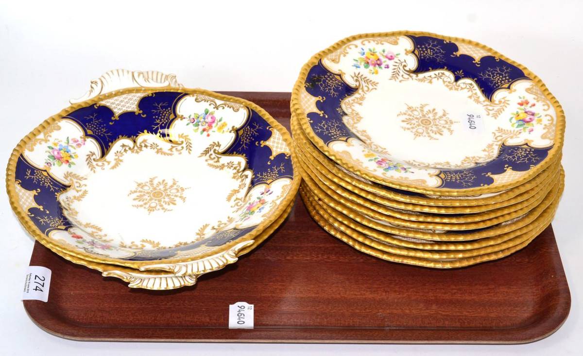Lot 274 - A Coalport gilt highlighted and floral painted part desert service; comprising of nine plates...