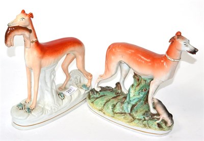 Lot 287 - Two 19th century Staffordshire hounds, both modelled standing (2)