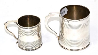 Lot 292 - Two similar silver mugs, Pearce & Burrows, London 1830; and Royes & Dix, London 1818, 8cm and...