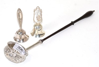 Lot 306 - An 18th century silver toddy ladle, unmarked, profusely chased with C scrolls, flowers and...